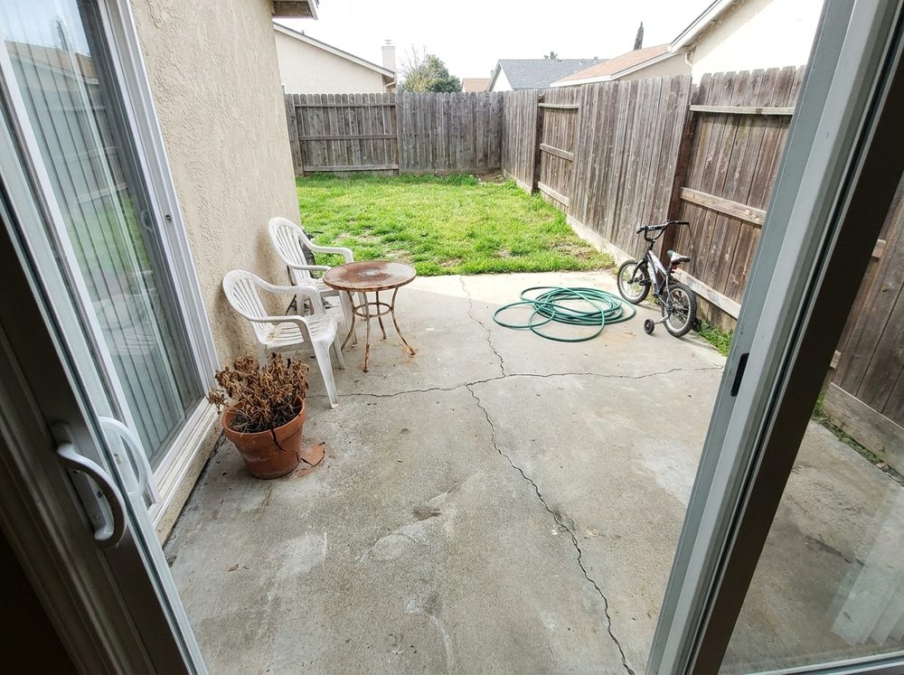 Before: outdoor patio prior to the organic modern makeover